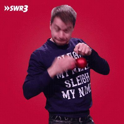 A Man Wearing A Sweater That Says " Sleigh My Name " GIF