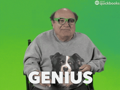 A Man Wearing A Sweater With A Dog On It And The Word Genius GIF