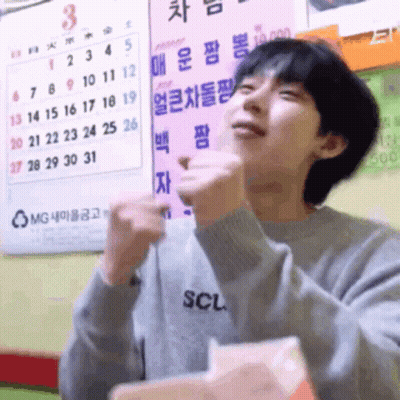 A Man Wearing A Sweater With The Word Scl On The Front GIF