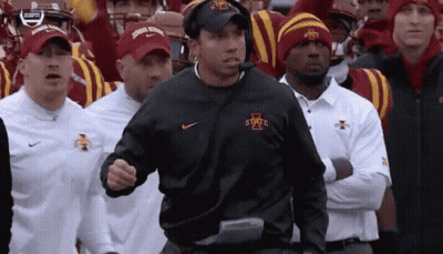 A Man Wearing A Sweatshirt That Says Iowa State GIF