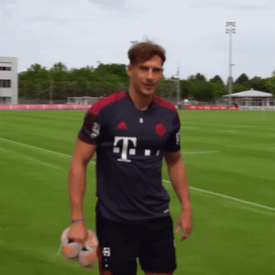 A Man Wearing A T-Mobile Jersey Stands On A Soccer Field GIF