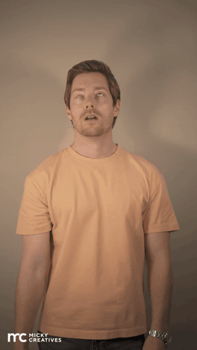 A Man Wearing A T-Shirt That Says " Big Vikes " GIF