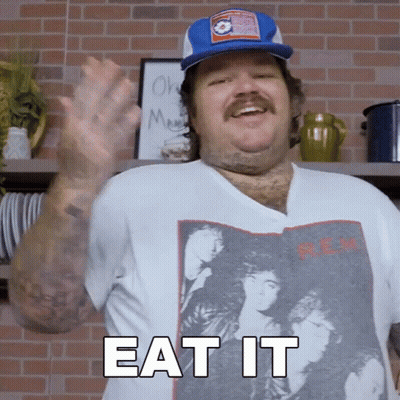 A Man Wearing A T-Shirt That Says " Eat It " GIF