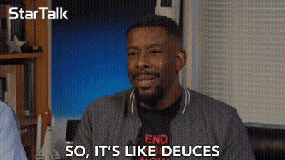A Man Wearing A T-Shirt That Says End Now Is Smiling And Says So It 'S Like Deuces GIF