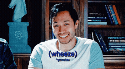A Man Wearing A T-Shirt That Says " Genuine " On It GIF