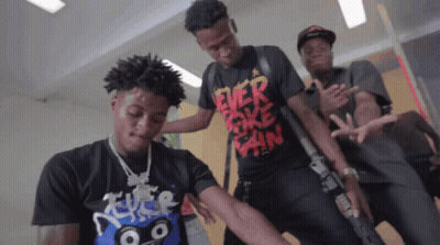 A Man Wearing A T-Shirt That Says Never Broke Pain GIF