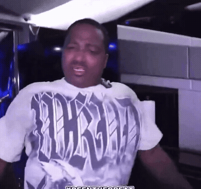 A Man Wearing A T-Shirt That Says Thrashed On It GIF