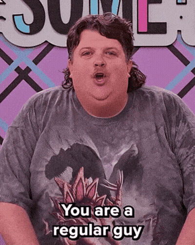 A Man Wearing A T-Shirt That Says " You Are A Regular Guy " GIF