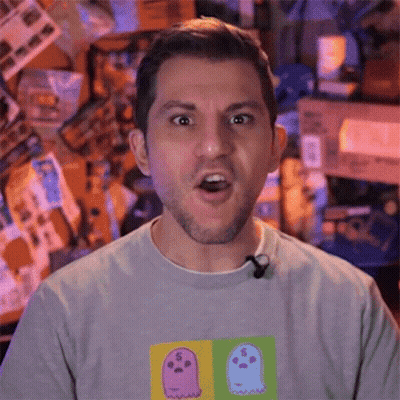 A Man Wearing A T-Shirt With Ghosts On It GIF