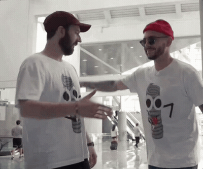 A Man Wearing A T-Shirt With The Number Seven On It GIF