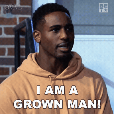 A Man Wearing A Tan Hoodie Says I Am A Grown Man GIF