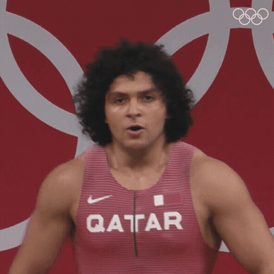 A Man Wearing A Tank Top That Says Qatar GIF