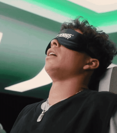 A Man Wearing A Tennis Eye Mask Is Sleeping On A Plane GIF