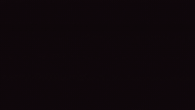 A Man Wearing A Thomas Cook Shirt Talks To Another Man GIF