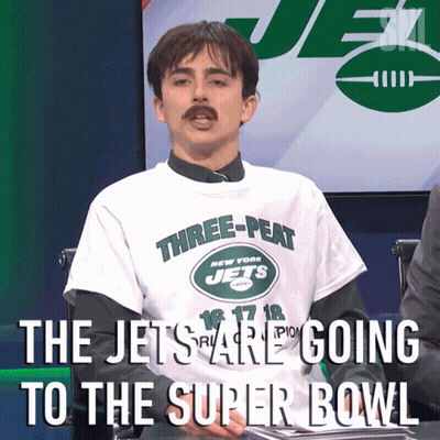 A Man Wearing A Three-Peat New York Jets T-Shirt GIF
