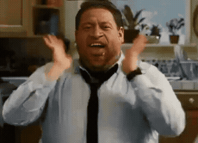A Man Wearing A Tie And A White Shirt Is Screaming In A Kitchen GIF
