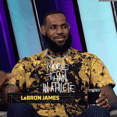 A Man Wearing A Tie Dye T-Shirt That Says More Than An Athlete GIF