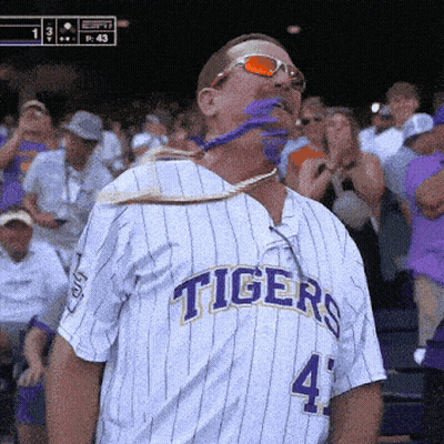 A Man Wearing A Tigers Jersey With The Number 4 On The Front GIF