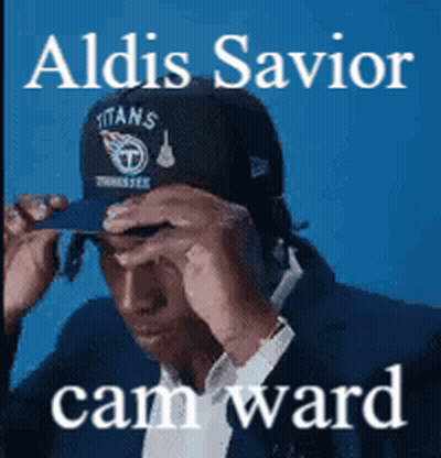 A Man Wearing A Titans Hat With The Name Aldis Savior Cam Ward On The Bottom GIF