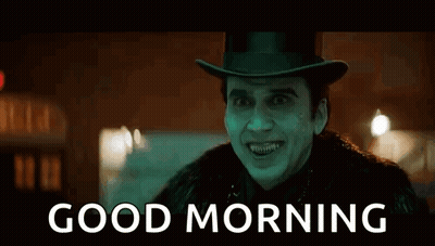 A Man Wearing A Top Hat And A Fur Coat Is Smiling And Says `` Good Morning '' . GIF