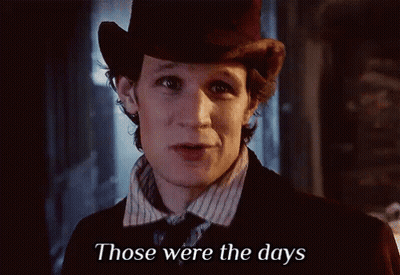 A Man Wearing A Top Hat And A Striped Shirt Says Those Were The Days GIF