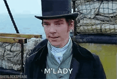 A Man Wearing A Top Hat And A Suit Is Standing In Front Of A Boat . GIF