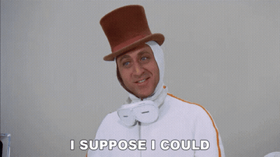 A Man Wearing A Top Hat And Goggles Is Saying I Suppose I Could GIF