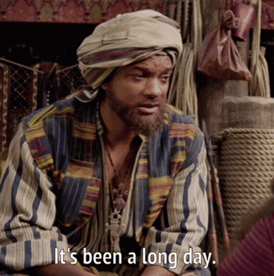 A Man Wearing A Turban And A Striped Shirt Says It 'S Been A Long Day GIF