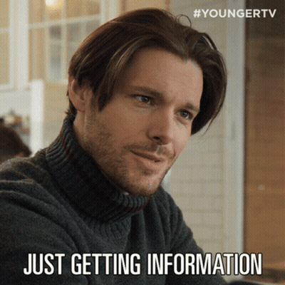 A Man Wearing A Turtleneck Sweater With The Words Just Getting Information Below Him GIF