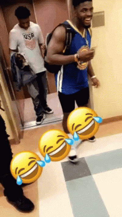 A Man Wearing A Usa Shirt Is Standing Next To A Man Wearing A Gold Jersey GIF