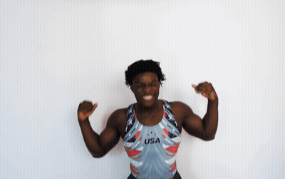 A Man Wearing A Usa Tank Top Is Dancing GIF