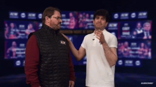 A Man Wearing A Vest That Says Nc On It GIF