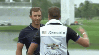 A Man Wearing A Vest With The Name Johnson On It GIF