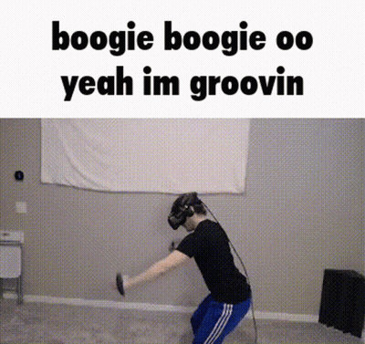 A Man Wearing A Virtual Reality Headset Is Doing A Boogie In A Room . GIF