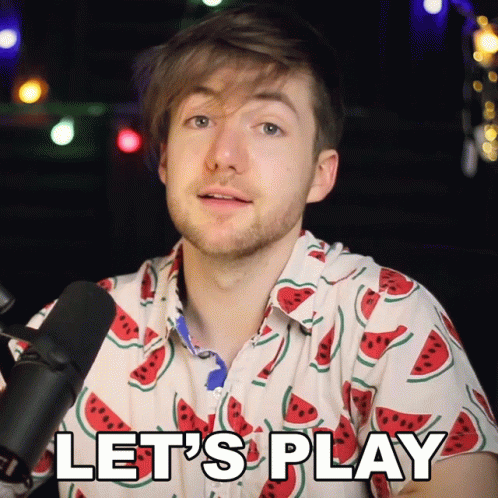 A Man Wearing A Watermelon Shirt Says " Let 'S Play " GIF