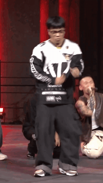 A Man Wearing A White And Black Jacket With The Number 17 On It GIF
