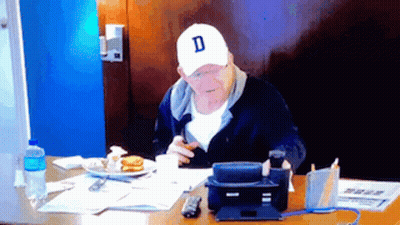 A Man Wearing A White Cap With The Letter D On It GIF