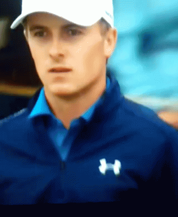A Man Wearing A White Hat And A Blue Under Armour Shirt GIF