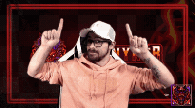 A Man Wearing A White Hat And A Pink Hoodie With The Word Nyr In The Background GIF