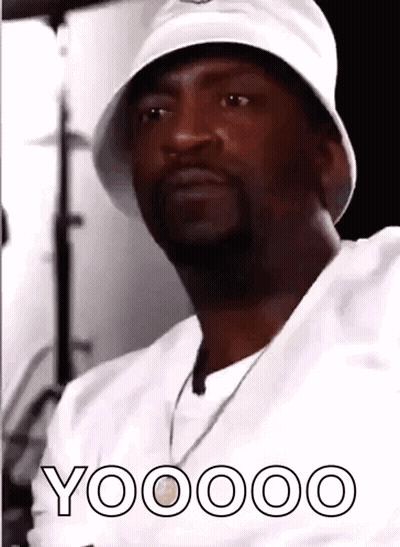 A Man Wearing A White Hat And A White Shirt With The Word Yoooo On It GIF