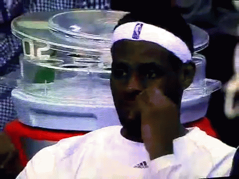 A Man Wearing A White Headband With The Nba Logo On It GIF