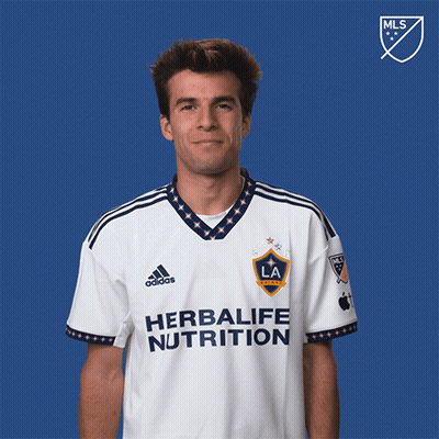 A Man Wearing A White Herbalife Nutrition Shirt GIF