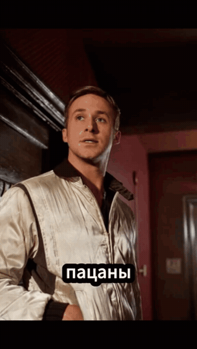 A Man Wearing A White Jacket Has A Foreign Language Sticker On His Chest That Says Pacanhos GIF