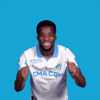 a man wearing a white jersey that says cma cgm on it