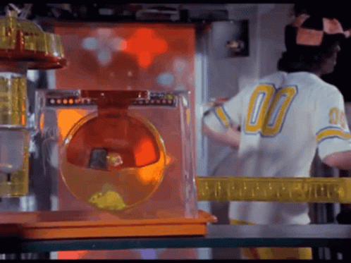 A Man Wearing A White Jersey With The Number 00 On It GIF