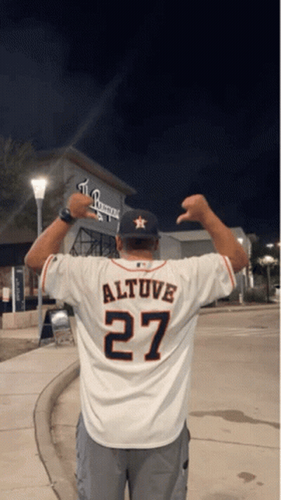 A Man Wearing A White Jersey With The Number 27 On The Back GIF