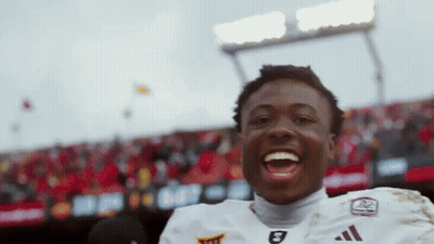A Man Wearing A White Jersey With The Number 8 On It GIF