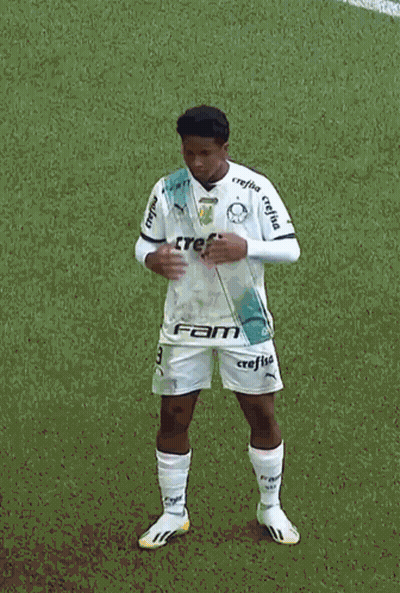 A Man Wearing A White Jersey With The Word Avanti On The Front GIF