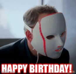 A Man Wearing A White Mask With The Words Happy Birthday In Red GIF