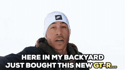 A Man Wearing A White Nike Beanie Says " Here In My Backyard Just Bought This New Gt-R " GIF